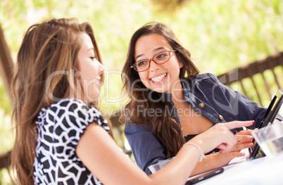 Expressive Young Adult Girlfriends Using Their Computer Electron