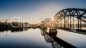 Riga city Autumn sunrise buildings train bridge Drone