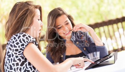 Expressive Young Adult Girlfriends Using Their Computer Electron