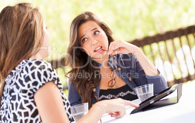 Expressive Young Adult Girlfriends Using Their Computer Electron