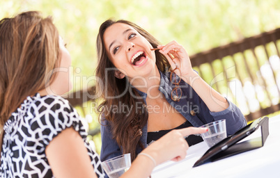 Expressive Young Adult Girlfriends Using Their Computer Electron