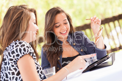 Expressive Young Adult Girlfriends Using Their Computer Electron