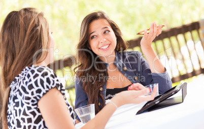 Expressive Young Adult Girlfriends Using Their Computer Electron