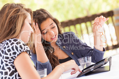 Expressive Young Adult Girlfriends Using Their Computer Electron