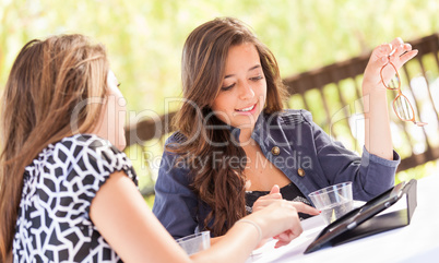 Expressive Young Adult Girlfriends Using Their Computer Electron