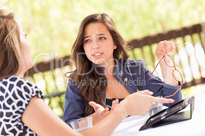 Expressive Young Adult Girlfriends Using Their Computer Electron