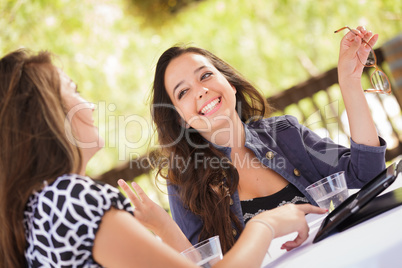 Expressive Young Adult Girlfriends Using Their Computer Electron