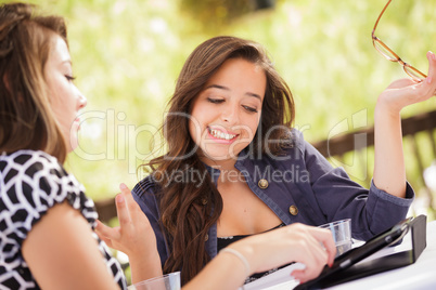 Expressive Young Adult Girlfriends Using Their Computer Electron