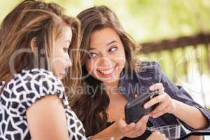 Expressive Young Adult Girlfriends Using Their Computer Electron