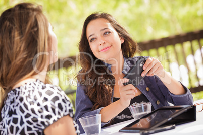 Expressive Young Adult Girlfriends Using Their Computer Electron