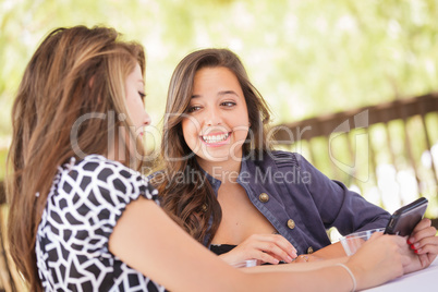 Expressive Young Adult Girlfriends Using Their Smart Cell Phone