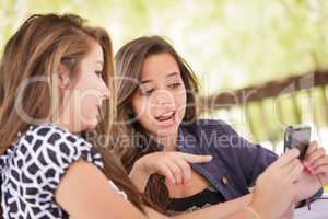 Expressive Young Adult Girlfriends Using Their Smart Cell Phone