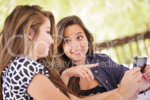 Expressive Young Adult Girlfriends Using Their Smart Cell Phone