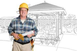 Male Contractor With House Plans Wearing Hard Hat In Front of Cu