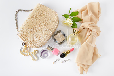 Cosmetics, perfumes, jewelry made of pearls and handbag