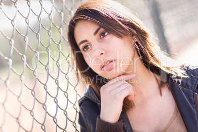 Beautiful Meloncholy Mixed Race Young Woman Portrait Outside.