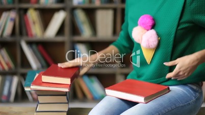 Hipster female student studiyng hard in library