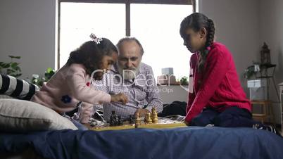 Little girl captured a pawn and celebrates at home