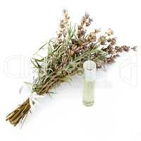 Flowers and lavender oil isolated on white