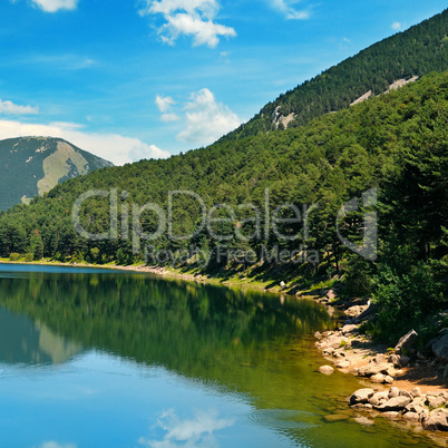 lake, mountains and blue sky