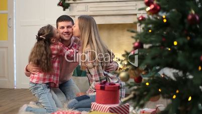 Portrait of affectionate family at Christmas