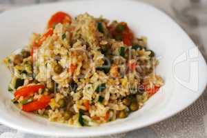 Rice, carrots, zucchini and peas