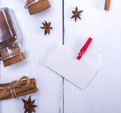 White paper tag on a red clothespin