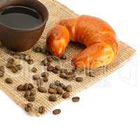 croissant and coffee isolated on white