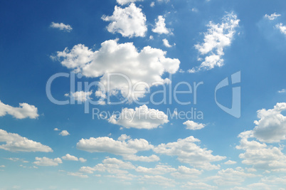 cumulus clouds in the blue sky