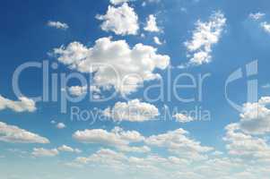 cumulus clouds in the blue sky