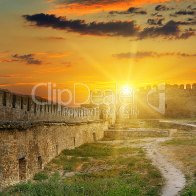 Sunrise over the fortress wall of a medieval fortress. Akkerman
