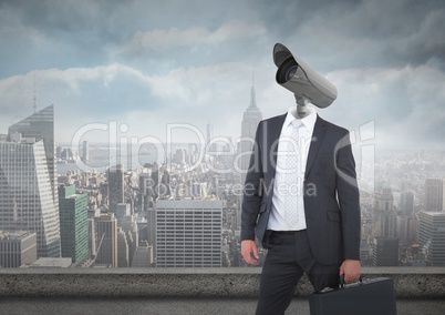 Businessman with CCTV head with city skyline