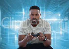 Businessman playing with computer game controller with bright light lines background