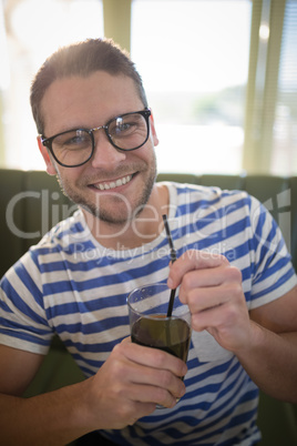 Man having drink in restaurant