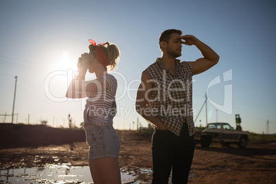 Couple standing together on a sunny day