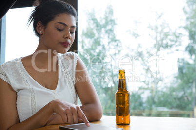 Woman using digital tablet