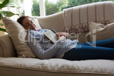 Woman sleeping peacefully on sofa