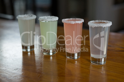 Close-up of tequila shot glasses