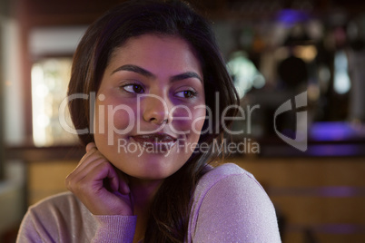 Woman smiling in the bar
