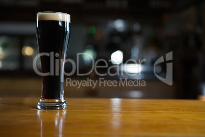 Close-up of beer glass on the counter