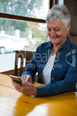 Senior woman using mobile phone