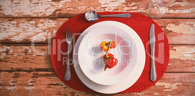 Overhead view of tomatoes served in plate