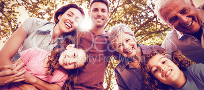 Happy family smiling at park