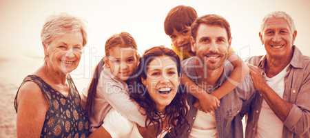 Happy family posing at beach