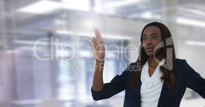 Businesswoman touching air in front of office