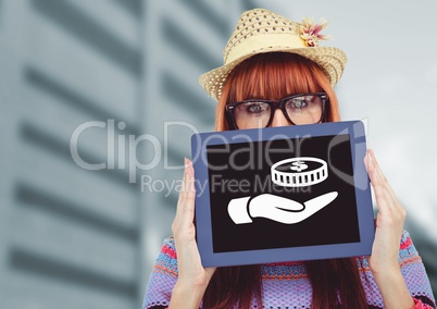 Woman holding tablet with hand giving money icon