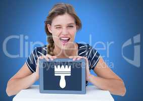 Woman holding tablet with clean brush icon