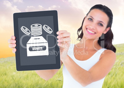 Woman holding tablet with donate box and money icon for charity