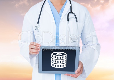 Doctor holding tablet with money icon