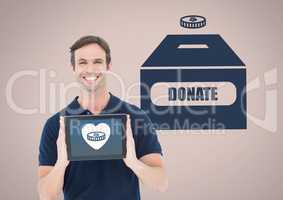 Man holding tablet with heart and money and donate to charity box
